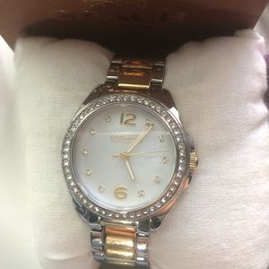 Coach Watch Mother of Pearl with crystal face in Gold and Silver.